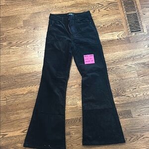 Black Label Corduroy Trousers in Black
